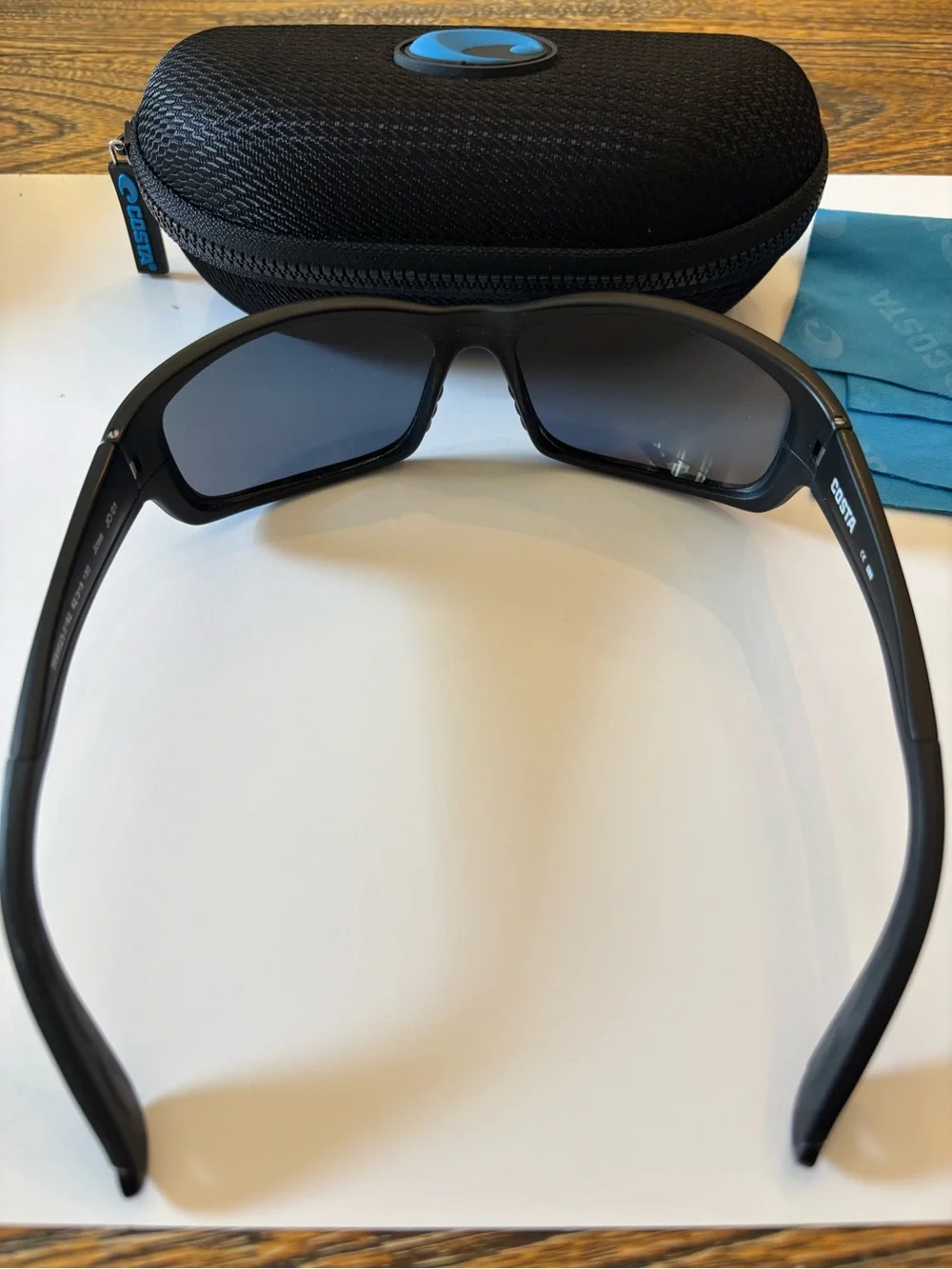Costa Jose JO 01 Sunglasses in Black with Blue Zip Case Accent